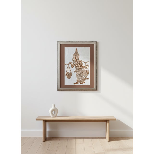 The image depicts a traditional figure, often identified as a female food vendor or a character like Nang Sida (the wife...