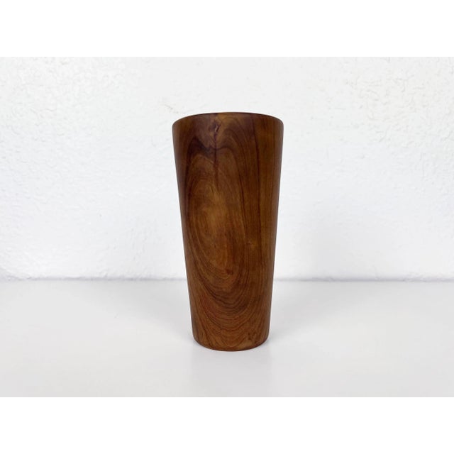 Vintage hand-turned wooden cup crafted from a solid block of teak. Beautiful figured grain contrast and form. Maker:...