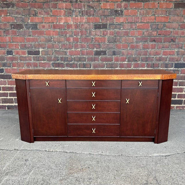 Amazing cork top credenza with brass x pulls by Paul Frankl for Johnson furniture fully restored.