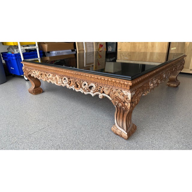 1960s Hand-Carved Indonesian Coffee Table With Black Granite Top For Sale - Image 4 of 8