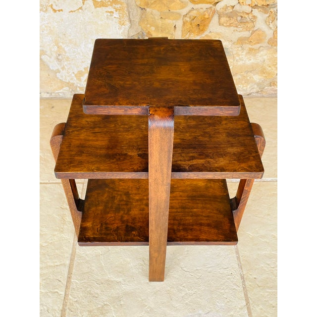Art deco side table with three shelves (tiers), circa 1930s. this side table/small console table, is made of walnut and...