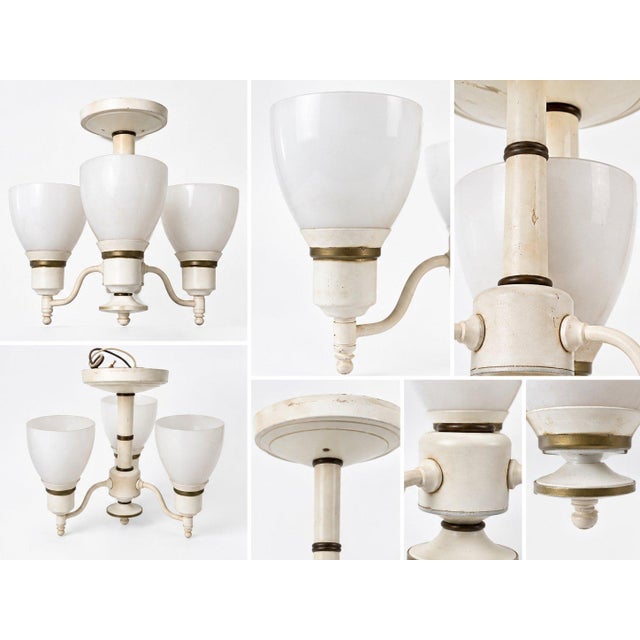 Vintage Mid-Century chandelier with subtle Streamline Moderne influences. This chandelier would look beautiful in a dining...