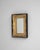 19th Century French gilded wood mirror. This elegant wall mirror features an intricately carved giltwood frame adorned...