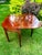 This antique, Federal-style, flame-mahogany game table, with a swivel and hinged, flip-top mechanism, is quite a...