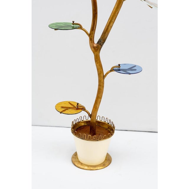 Unique piece: brass shaft, made in italy, 1950s. Rare and elegant tree sculpture made of brass and stained glass. A...