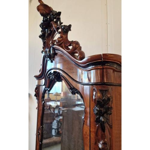 Beautifully carved cabinet.Walnut, oak.Holland.1860s.Dimensions: height 231cm; width 105cm; depth 53cm