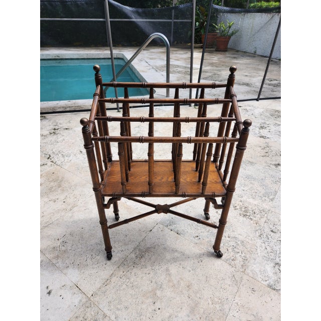 Chic Wood Faux Bamboo Magazine Rack sold as found previously owned and used in good condition.