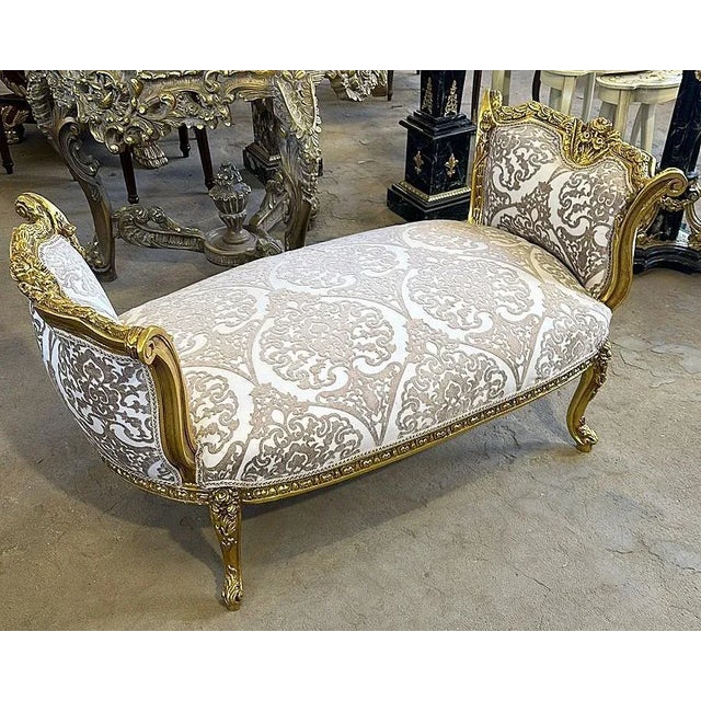 Stunning lovely bench/settee. This is fully refinished in gold and tufted in high end designer fabric. The frame has gold...