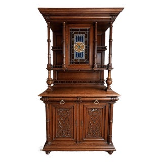 Late 19th Century French Carved Oak Two Piece Cupboard With Stained Glass For Sale