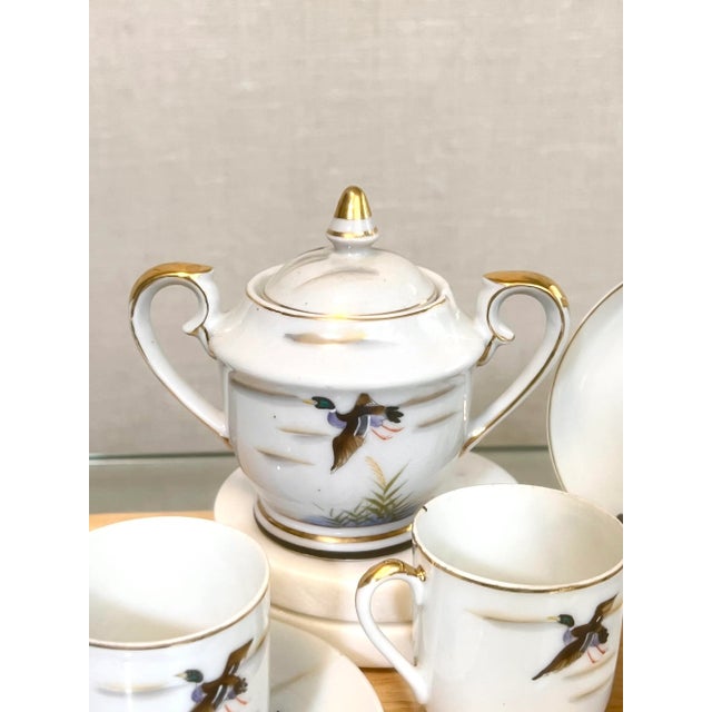 Antique Hand-Painted Ducks in Flight Teacup and Saucer Sets with Creamer & Sugar- 10 Pieces For Sale - Image 4 of 7