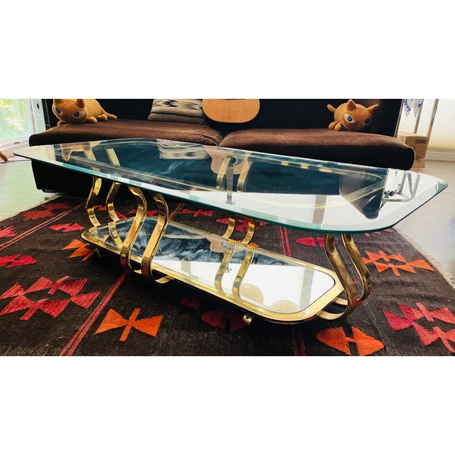 If you love that special glam appeal that comes with vintage Hollywood Regency / Neo Deco tables, you may love this one!...