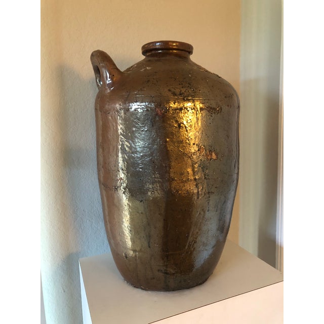 Monumental Antique Primitive Brown Stoneware Jug With Handle. For whiskey or moonshine Albany slip glaze Rounded beehive...