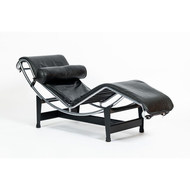 This authentic LC4 chaise lounge chair designed by Le Corbusier was produced by Cassina in 1981. The chair features a...