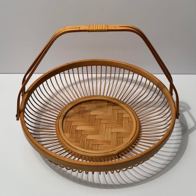 Step back in time with this authentic 1970s vintage Japanese "Hanakago" bamboo flower basket, Handcrafted with precision...