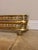 Quality antique Edwardian brass fire fender, having a quality brass fire fender with a pierced brass border above three...