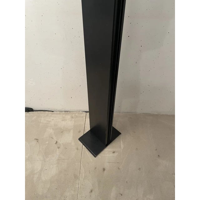Postmodern floor lamp, radical design circa 1980. Black lacquered metal. Some traces. Beautiful condition. Works. European...