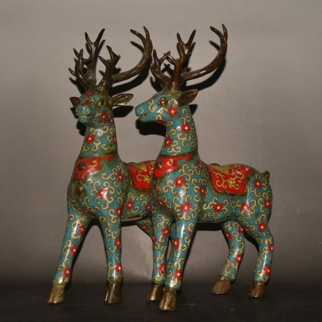 A magnificent and elegant pair of vintage Chinese cloisonné deer sculptures, sourced from a private collection. Standing...