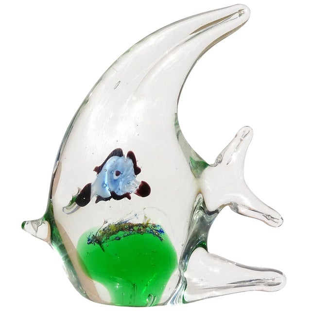 Beautiful fish and starfish shaped paperweights. Each pieces is a contained aquarium itself. The 2 fish pieces has other...