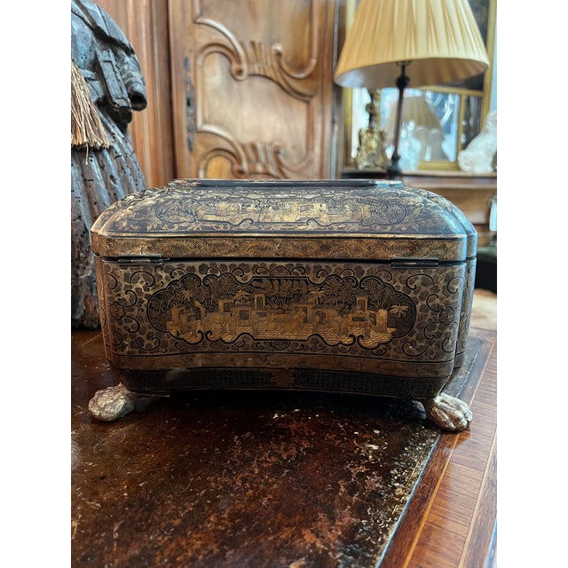 A stunning and richly decorated 19th-century Chinese Export box, this piece is a testament to the masterful lacquer work...