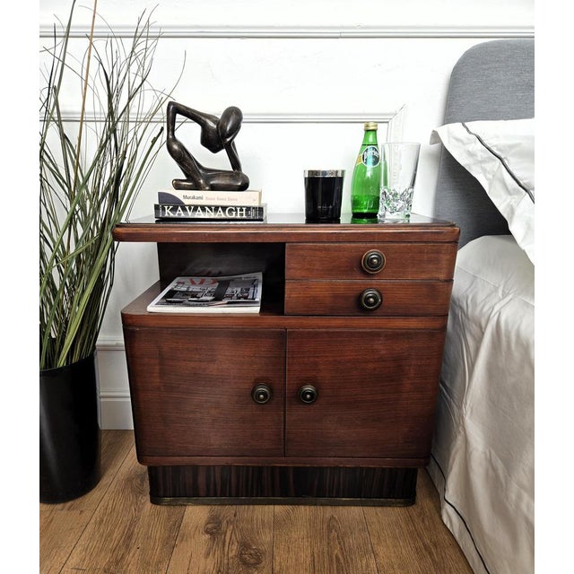 Elegant and refined pair of Italian 1940s Art Deco bedside tables with great design shape and detail of every part and...