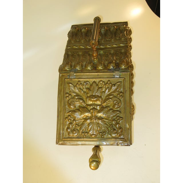 This is an antique Victorian coal box, hod, or scuttle made of brass in Scotland during the 19th century. It features...