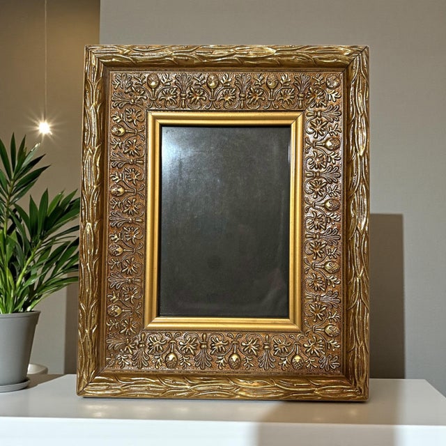 Antique Style French Decor with Vintage, solid wood, gold colored frame with ornate detailing. Has a glass front and could...