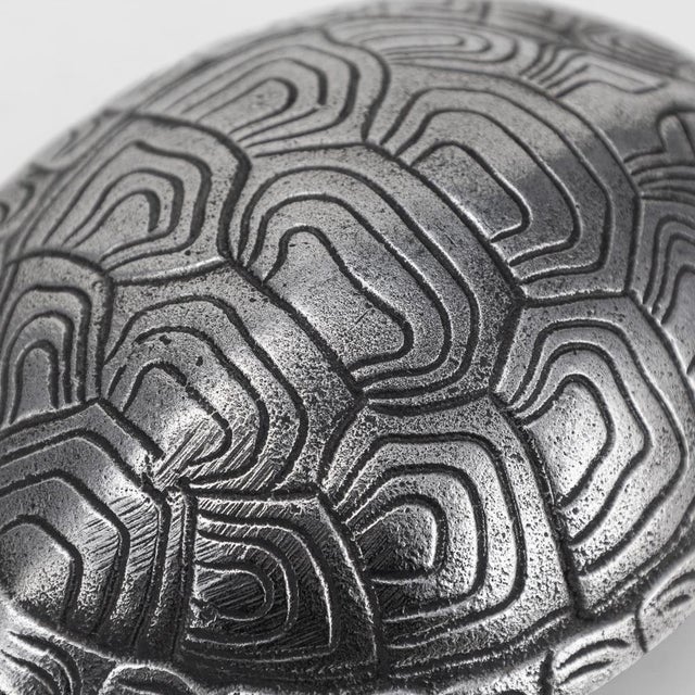 Antique 20th Century English cast iron desk bell crafted in the form of a tortoise. The bell mechanism beneath, once wound...