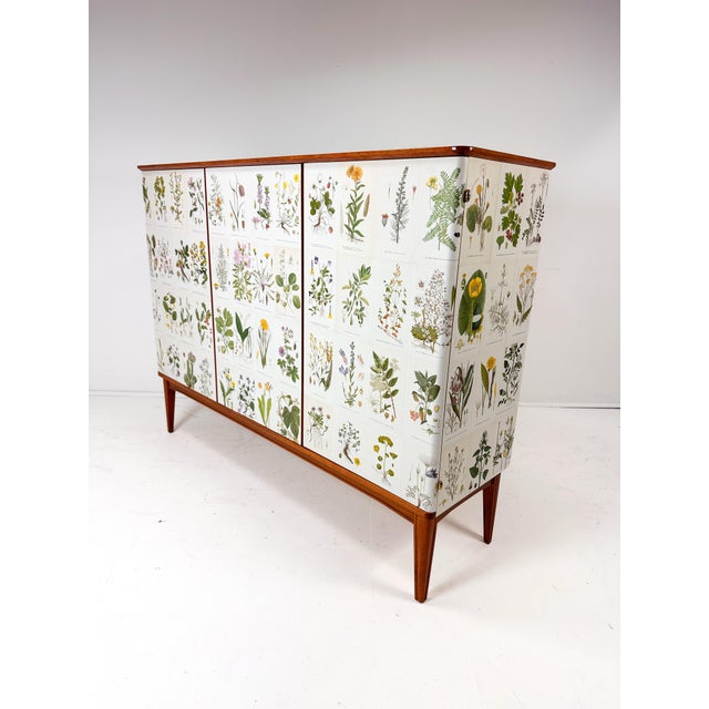 Mid-Century Modern 1950’s Swedish Cabinet With Nordens Flora Illustrations For Sale - Image 3 of 9