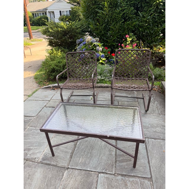 Exceptionally rare original Brown Jordan Tamiami patio set featuring 2 cantilever chairs, 2 side chairs with footrests and...
