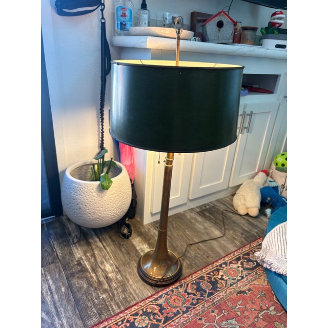 Elegant vintage Frederick Cooper brass floor lamp featuring a tall tapered column, trumpet-form base, dual pull-chain...