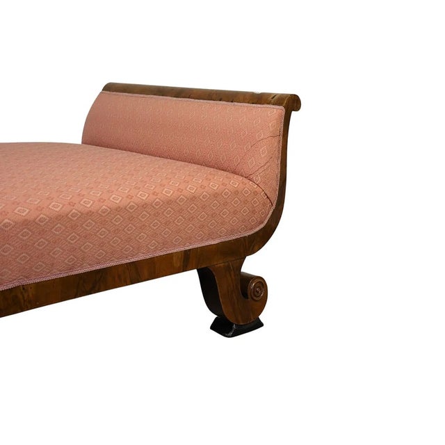 This rare 19th century drop end Biedermeier style daybed features a rich brown frame, making it a standout piece of...