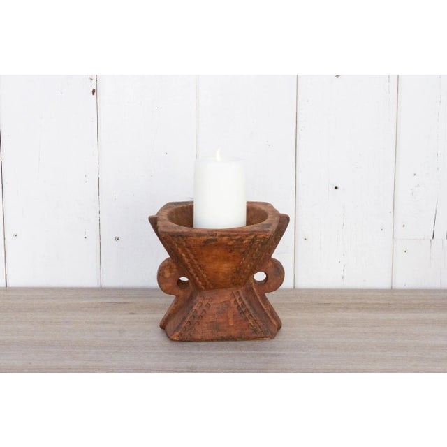 These rustic, antique hand-carved teak Bijani three hole seeder. A traditional farm tool from India, re-purposed as a...