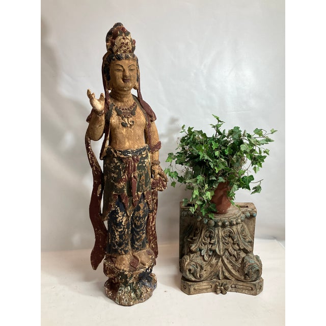 Our Quan Yin Empress of Compassion Goddess is a wooden carved statue. Quan is a symbol of compassion, peace and serenity -...