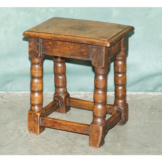 Wonderfully characterful late 17th / early 18th century English oak joint stool, circa 1680–1720, of traditional pegged...