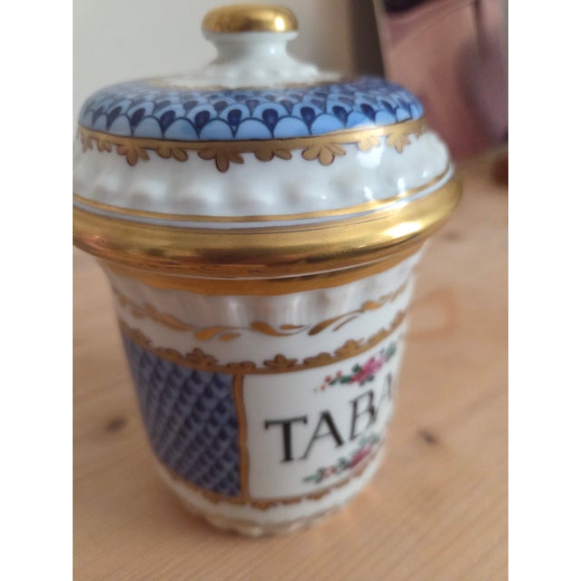 The word TABAC in bold letters across the front tells you exactly what this lidded ceramic pot was made for — and the...