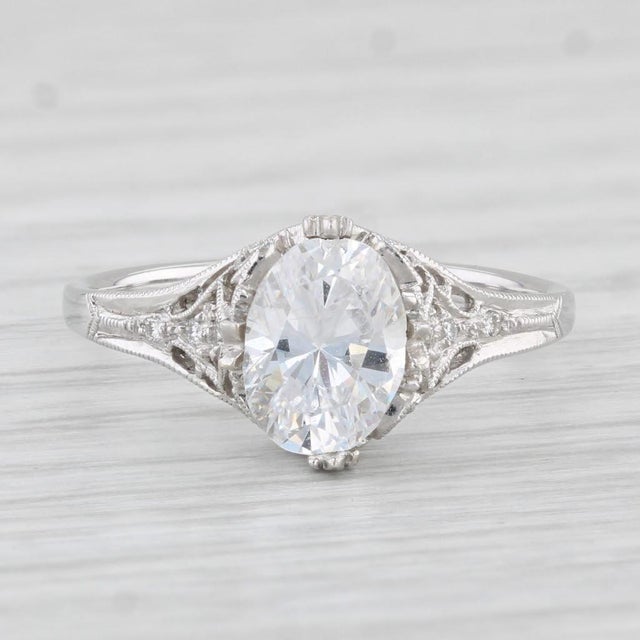 This lovely ring is a semi mount designed to hold a oval 5.5 x 8.5 mm / 1.20ct diamond or stone of your choice. There is a...