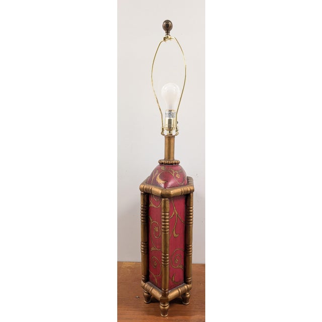 Elevate your space with this captivating vintage English Chinoiserie hexagonal table lamp. Drenched in a rich red...