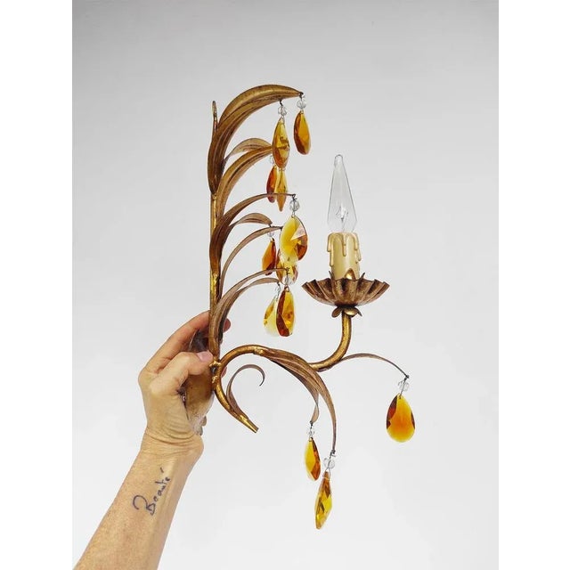 Metal is quite light. It works with one bulb type E14 Up to 250V (Europe/UK Standard).The wiring of this item may be...