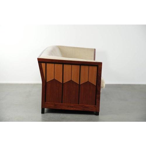 Offered by ByThijs is this Schuitema Art Deco design sofa in good condition, featuring beautiful woodwork from the...