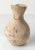 We are selling this early small miniature pottery oil jug with handle in pottery. We are unsure of the exact age or...