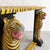 A distinctive vintage wooden console table, hand-painted in a bold tiger-stripe pattern with two sculptural tiger figures...