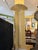 Elevate your space with this dramatic, sculptural pair of vintage Hollywood Regency palm tree torchiere lamps. Modeled...