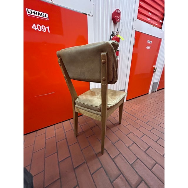 Vintage Mid-Century, circa 1960s–1970s. Camel/Beige Soft Leather on a light blonde wood frame. Piece has a wonderful...