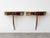 A refined pair of small wall-mounted console tables, beautifully suited as floating bedside tables or entryway trinket...