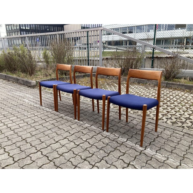 Niels Otto Möller Modell 77 for J.L. Möllers Mobelfabrik. Solid teak frame with blue fabric Halingdal. Set of 4. Classic...