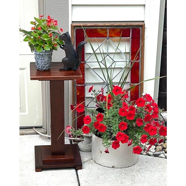 This 1880’s plant stand was made during the Arts and Crafts/Mission Style movement in America; a reaction against mass...