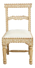 Example of British Colonial Accent Chairs