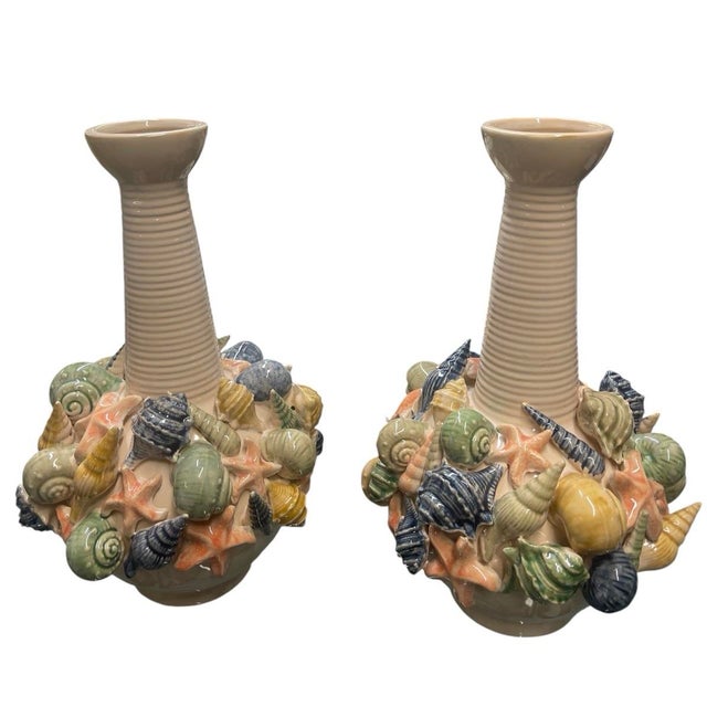 Capture the essence of the Mediterranean with this striking pair of vintage-inspired Italian ceramic vases. Each vase...