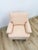 This vintage Drexel Heritage armchair brings a soft, romantic presence to any living room or reading nook. Upholstered in...