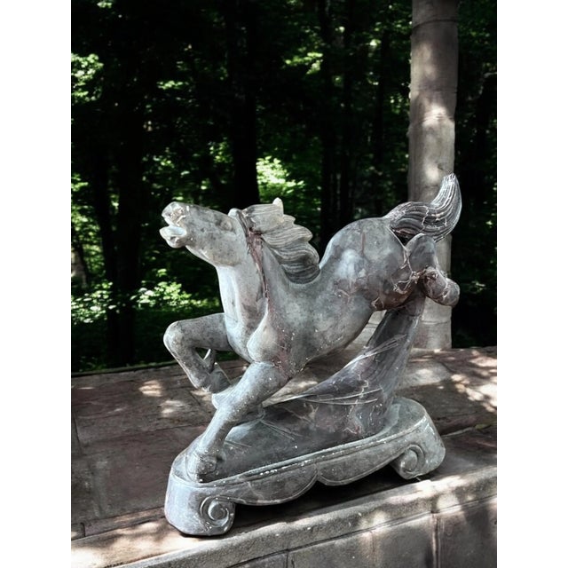 Beautiful vintage carved natural stone horse sculpture . The two toned stone has gray and brown/ purplish colors....